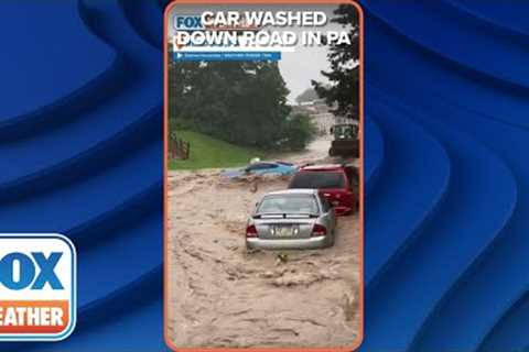 Car Washes Down The Road During Intense Flooding In Reading, PA